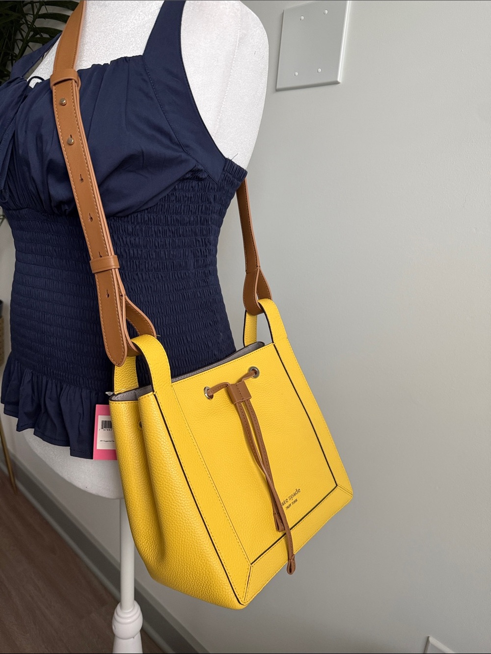 kate spade Yellow Pebbled Leather Bag with Tan Strap comes with dusk bag.